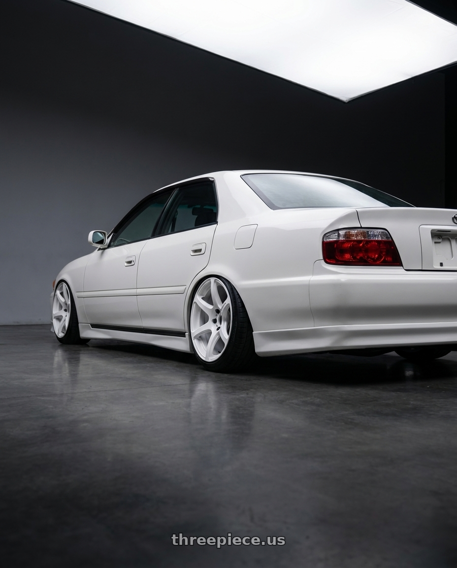 1998 Toyota Chaser with Work Emotion T7r 5x114.3 18x9.5 +22 White wheels rear three quarter view square tires