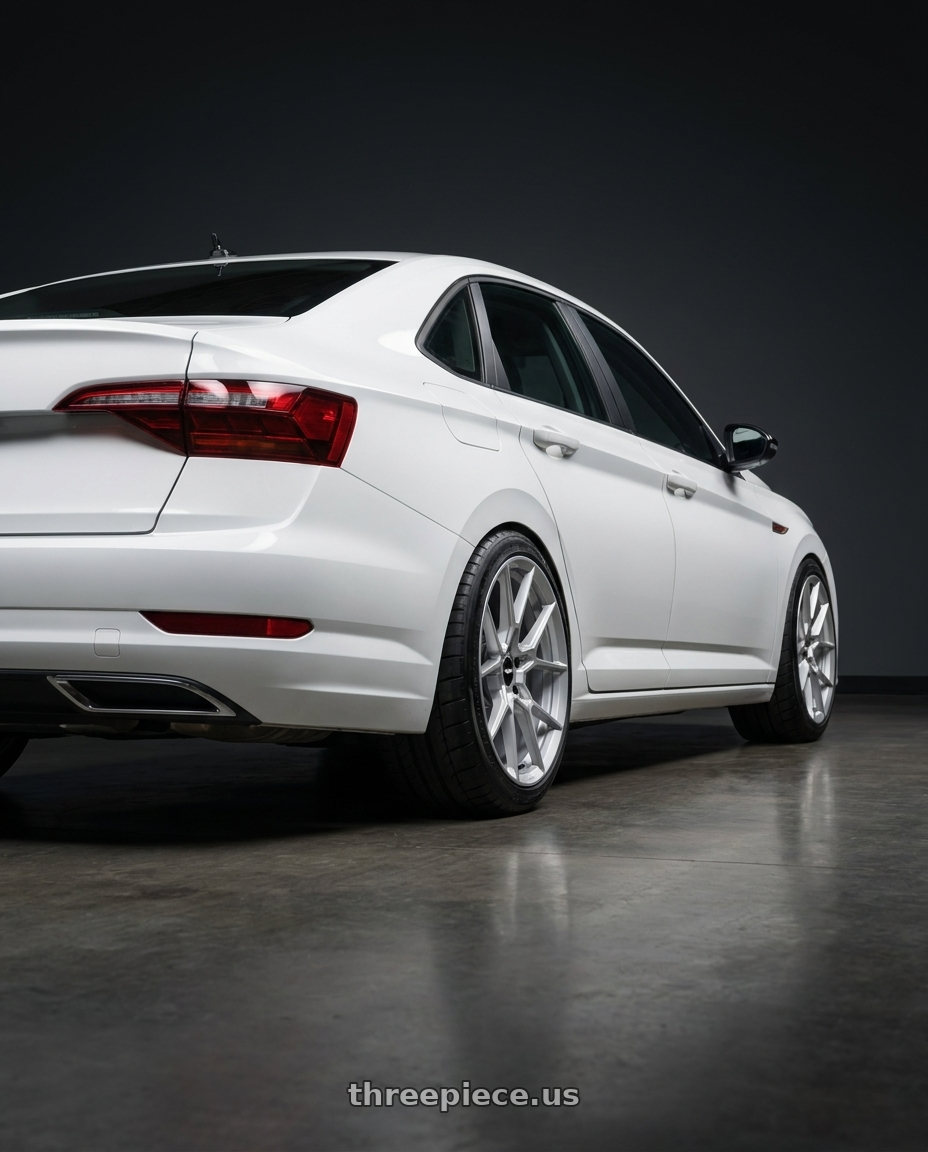 2026 vw jetta with Rotiform RC199 KPR 5X112 20x9 +45 SILVER wheels rear three quarter view meaty tires
