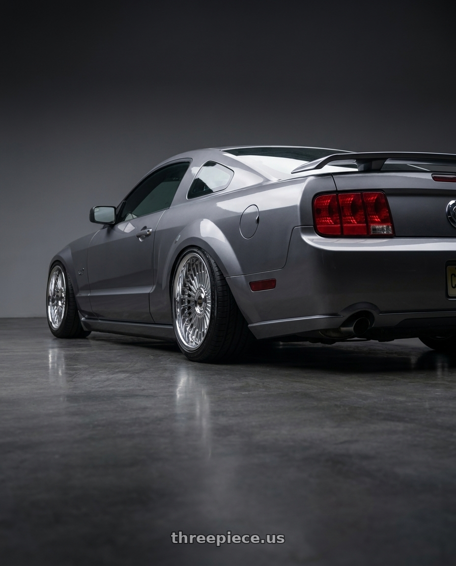 2005 mustang gt with Work Emitz Chrome 5x114.3 19x9.0 +45 wheels rear three quarter view square tires