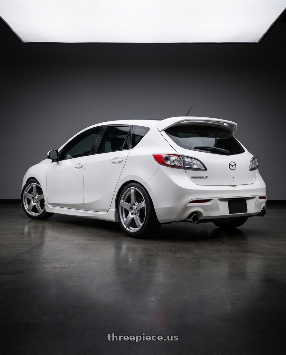 2012 Mazda Mazdaspeed3 with Ssr Gtv01 5x114.3 18x8+35  GLARE SILVER wheels rear three quarter view square tires