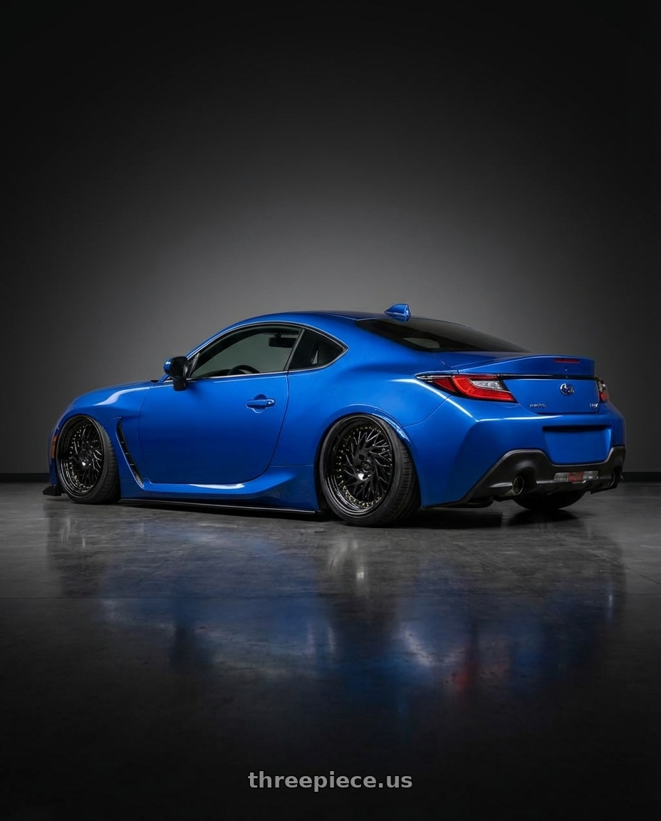 2024 Subaru BRZ with Aodhan DS03 5x114.3 18x9.5 +30 Black Vacuum w/ Gold Rivets wheels rear three quarter view slight stretch tires