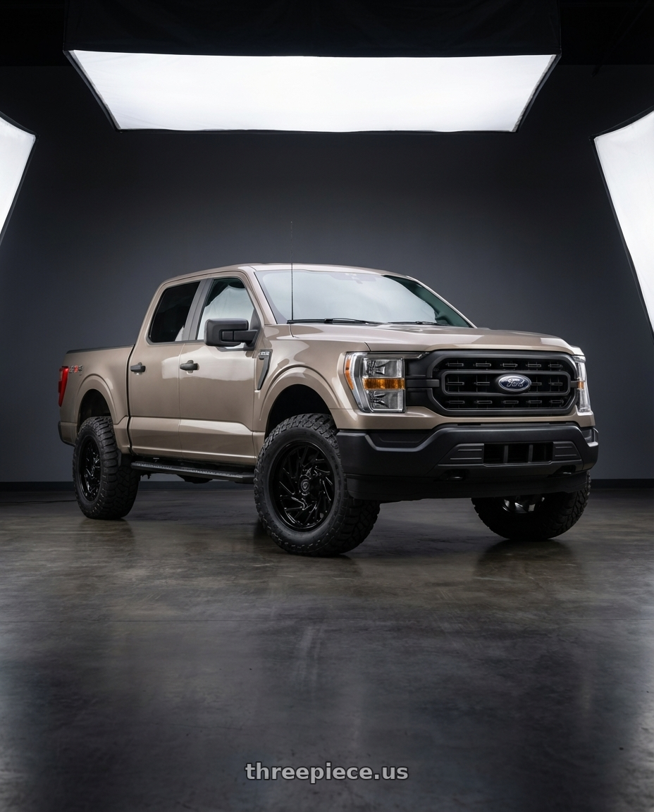 2013 Ford F-150 with Gear Off Road 769B 6X135/6x139.7 20x9 +18 Gloss Black wheels front three quarter view stock stance