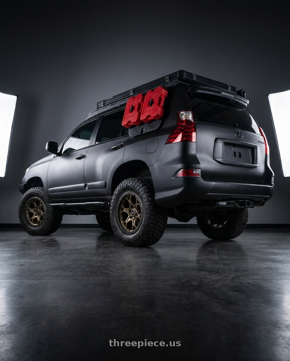 2012 Lexus gx460 with WELD Off-Road Ledge 6x139.7 20x9 0 Satin Bronze / Satin Black wheels rear three quarter view meaty tires