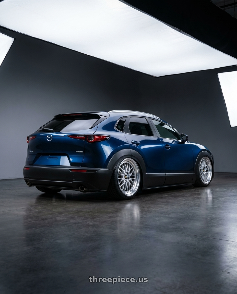 2020 Mazda cx30 with BBS LM 5x114.3 18x8.5+38 Diamond Silver wheels rear three quarter view slight stretch tires