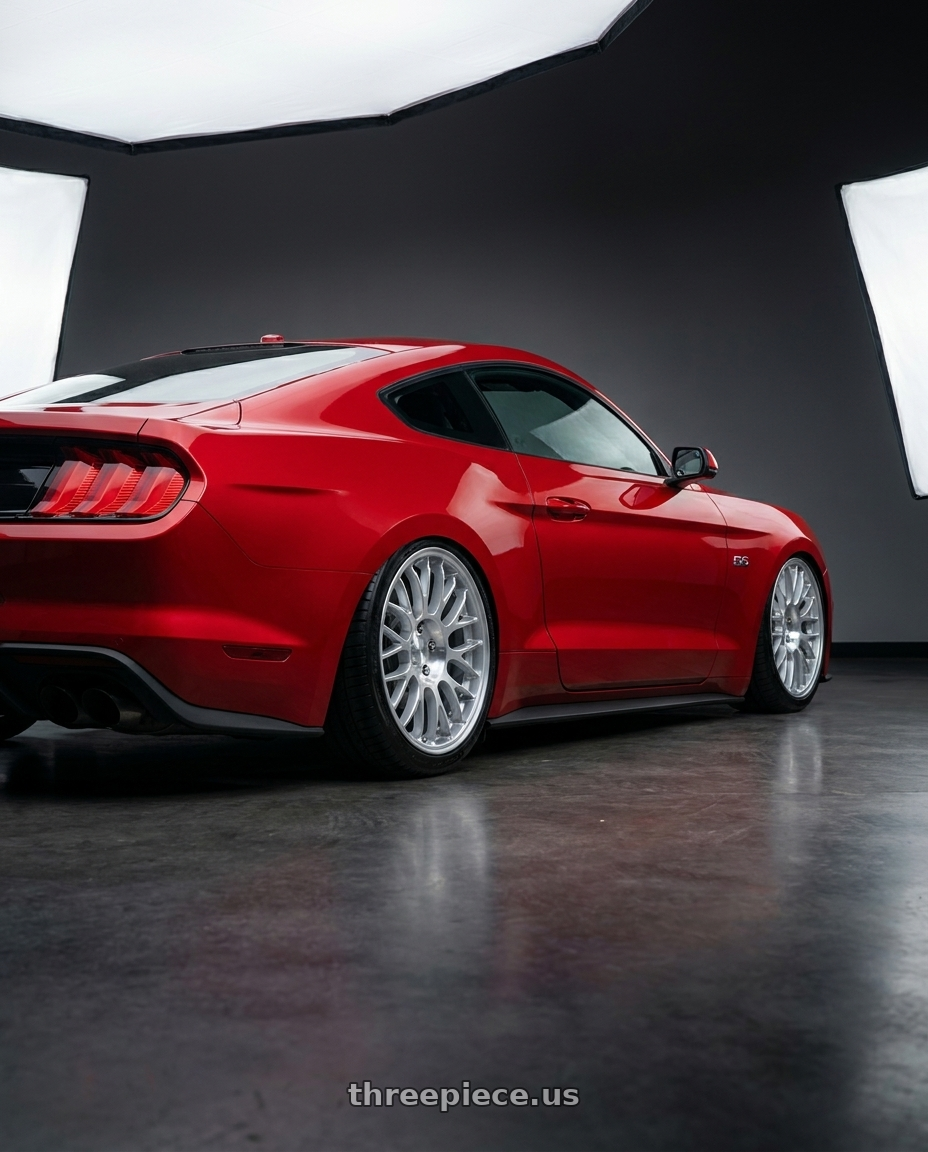 2020 Ford mustang with Rotiform RC204 PHX 5X112 19x8.5 +45 GLOSS SILVER W/ MACHINED FACE wheels rear three quarter view slight stretch tires