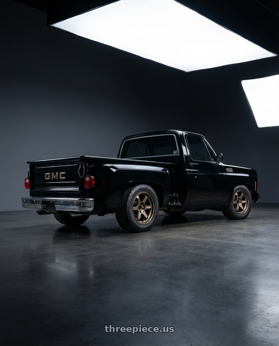 1974 GMC Sierra with Volk Racing TE37 Ultra M Spec 5x112 19x9.5+23 19x10.5+35 Bronze Almite Toyota Supra MK5 Spec wheels rear three quarter view meaty tires