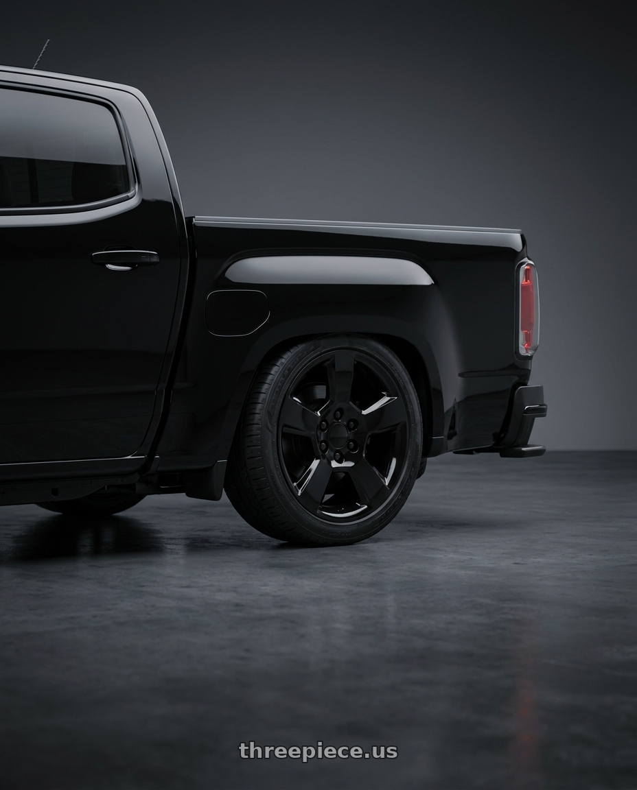 2018 GMC Canyon with OE Wheels CV76 6x139.7 20x9+27 Gloss Black wheels rear three quarter view square tires