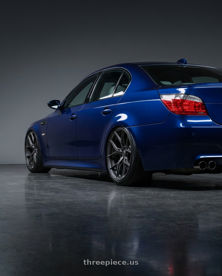 2010 BMW M5 E60 with Vossen HF-5 20x9 / 5x120 / ET35 / Flat Face / 72.56 - Matte Gunmetal Wheel - HF5-0B02 wheels rear three quarter view slight stretch tires