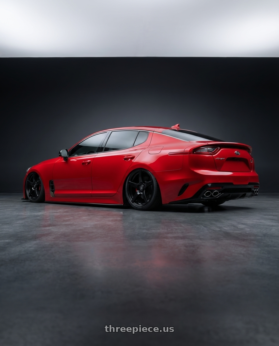 2022 Kia Stinger GT with Forgestar CF5 5x114.3 19x9 +35 Gloss Black wheels rear three quarter view slight stretch tires