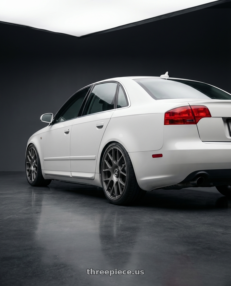 2010 Audi A4 B7 with fifteen52 APEX 5x112 / 5x120 18x8.5 +35 FROSTED GRAPHITE (SATIN GREY) wheels rear three quarter view square tires