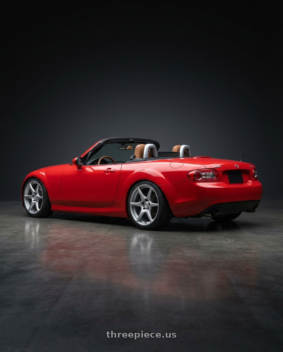 2012 Mazda MX-5 Miata NC with Kansei K11S Tandem 5x114.3 17x9 22 Hyper Silver wheels rear three quarter view square tires