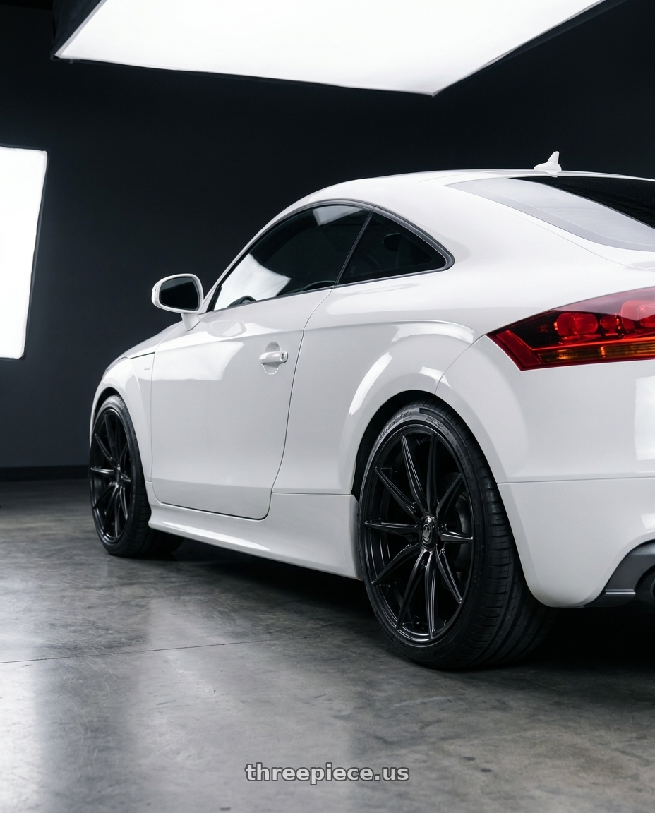 2012 Audi TT Prestige S-line with Konig 37B Oversteer 5x112 19x8.5 +42 Gloss Black wheels rear three quarter view square tires