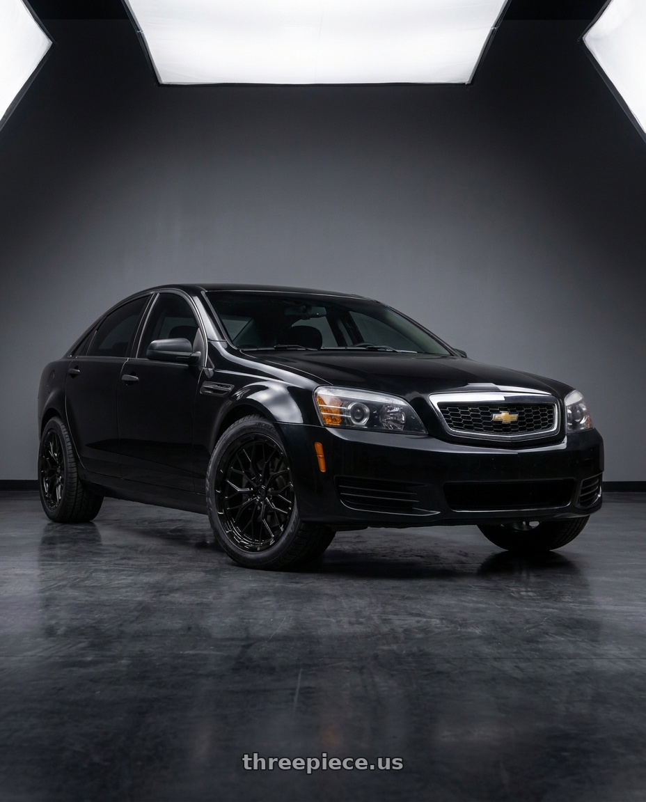 2014 Chevrolet Caprice PPV with DOLCE PERFORMANCE MAGARI 5x120 19x9.5 +40 Gloss Black wheels front three quarter view stock stance