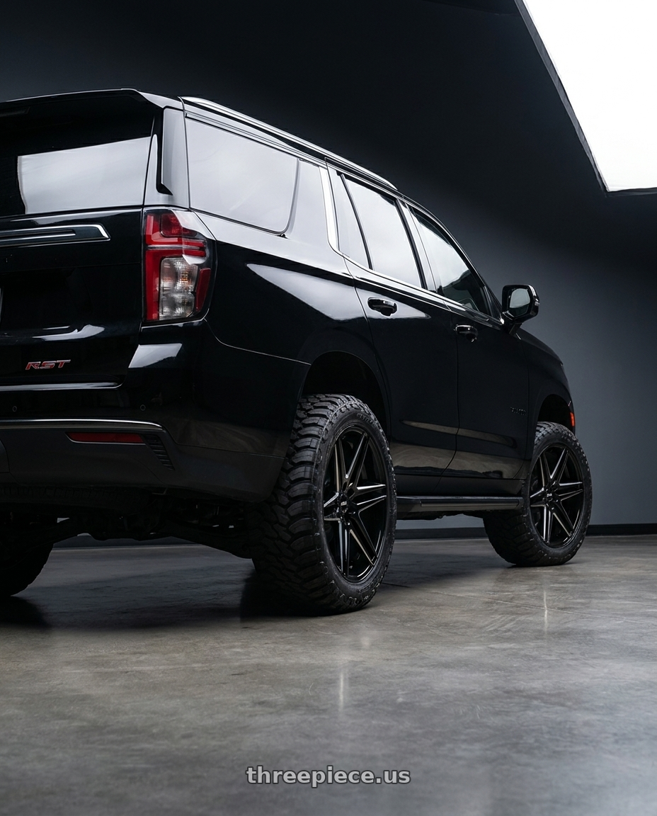 2022 Chevrolet Tahoe RST 6.2 cubic inch engine  with DUB 1PC S267 DIRTY DOG 6X139.7 24X10 +25 GLOSSY BLACK MILLED wheels rear three quarter view meaty tires