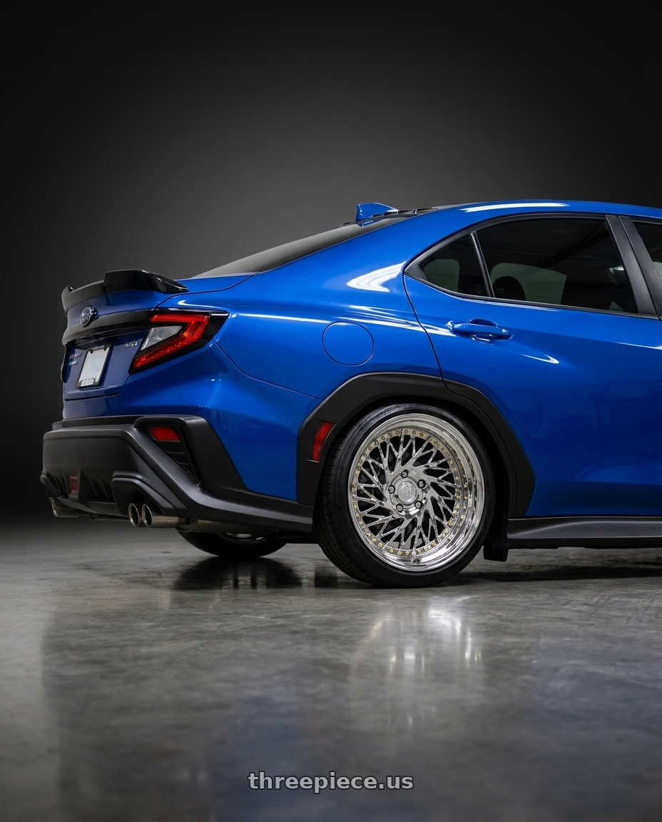 2023 Subaru wrx with Aodhan DS03 5x114.3 18x9.5 +30 Vacuum Chrome w/Gold Rivets wheels rear three quarter view slight stretch tires