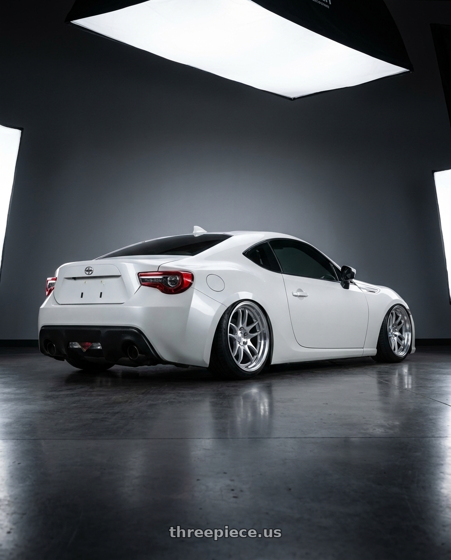 2016 Scion FR-S with Aodhan AH09 5x100 18x9.5 +35 Gloss Silver Machined Face wheels rear three quarter view slight stretch tires