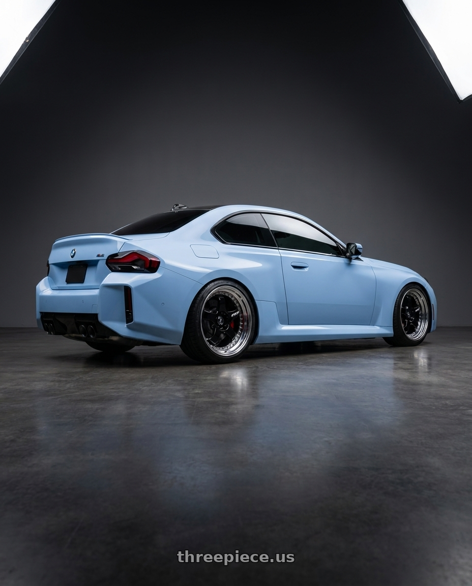 2023 BMW M2 with Work Meister S1 3P 5x100 18x9+48 A Disk Black wheels rear three quarter view square tires