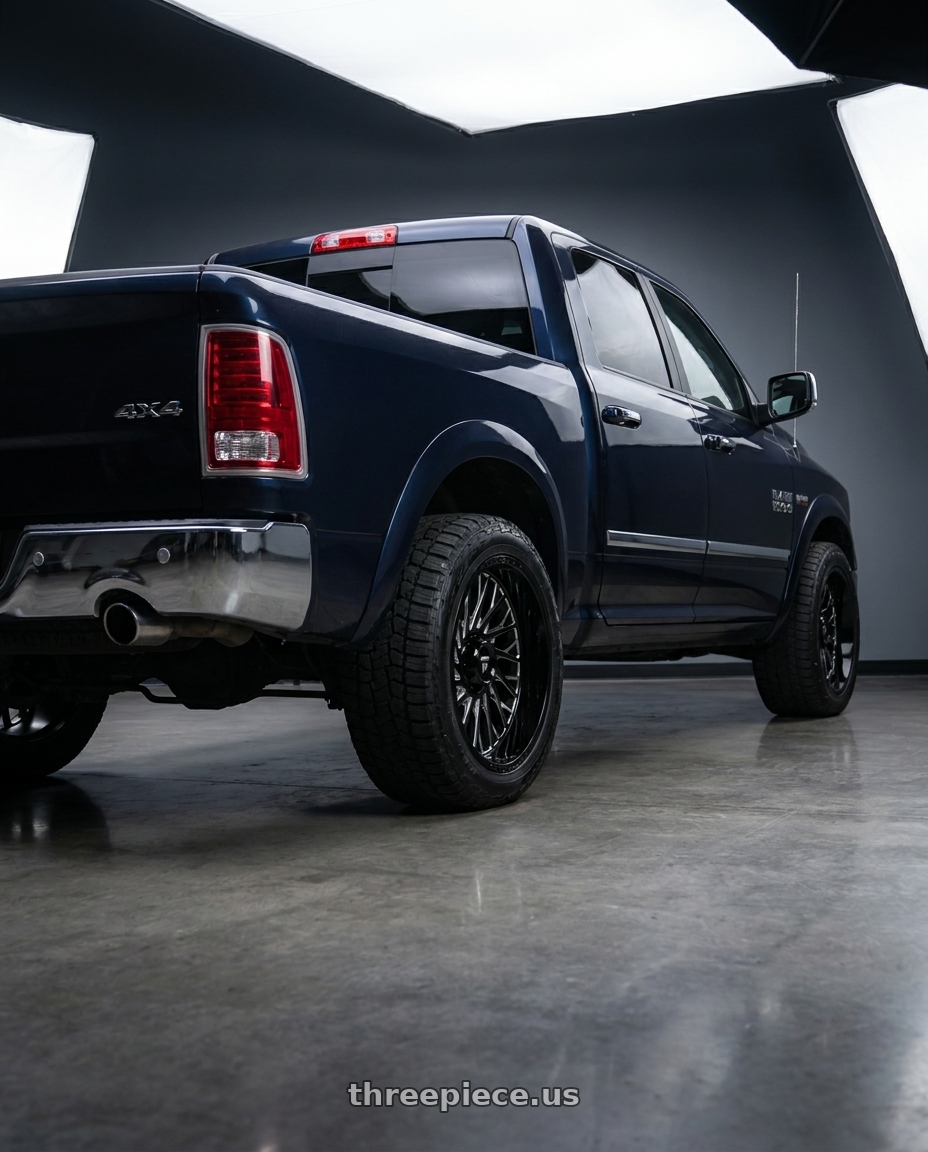 2016 ram 1500 with Fittipaldi Offroad FA08BM 5x139.7/5X150 20x10 -19 Gloss Black Milled wheels rear three quarter view square tires
