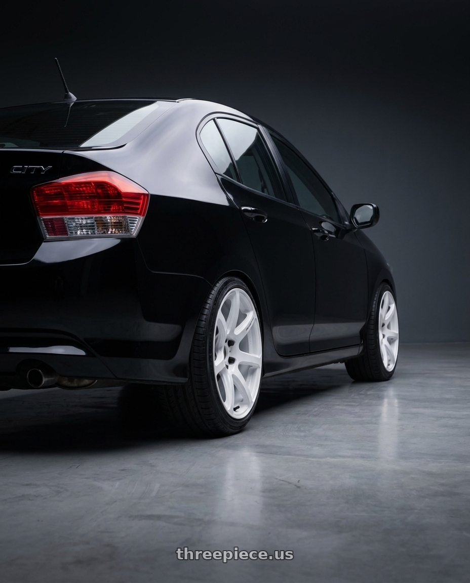 2012 honda city 1 5 with Work Emotion T7R wheels rear three quarter view square tires