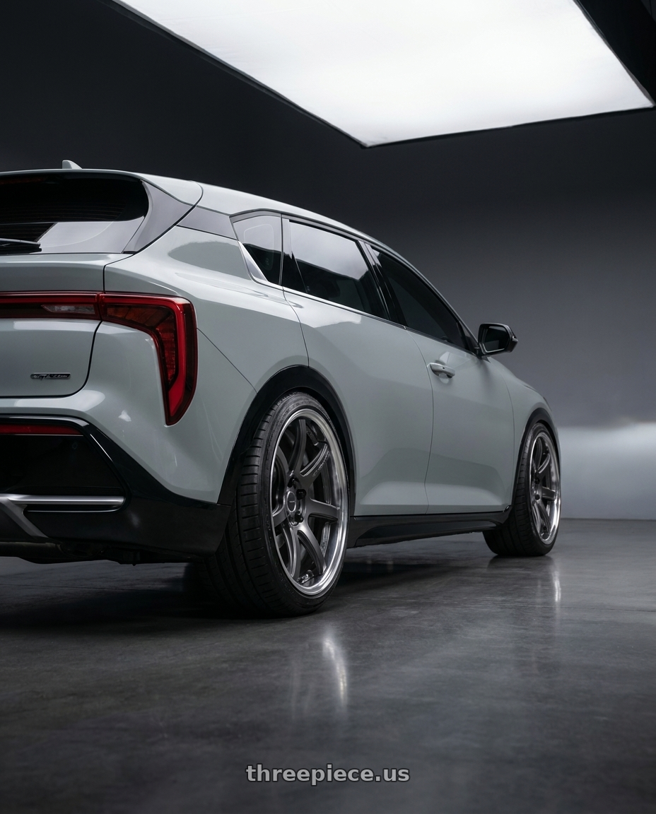 2026 Kia K4 Hatchback GT-Line with Work Emotion T7R 2P wheels rear three quarter view slight stretch tires