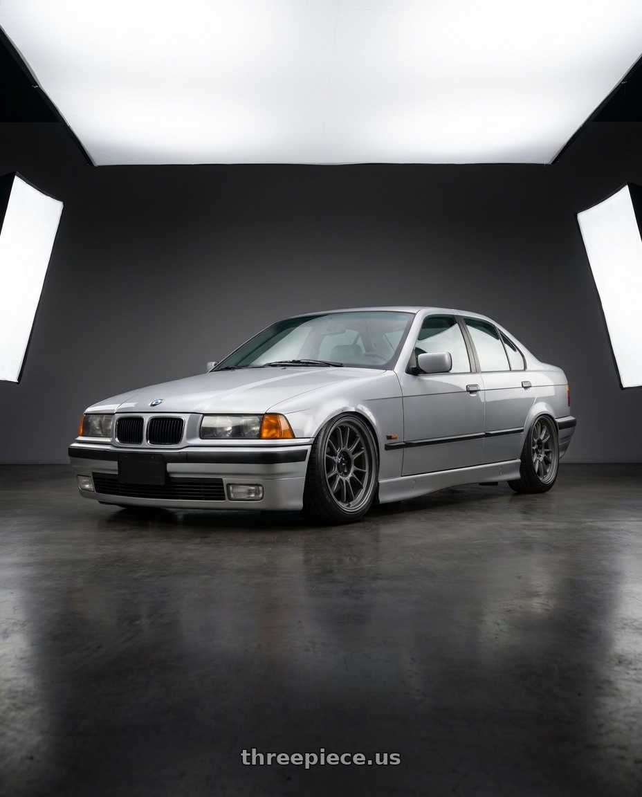 1996 BMW 328i with Konig 47MG Hypergram 5x120 18x8.5 +35 Matte Grey wheels front three quarter view stanced stance