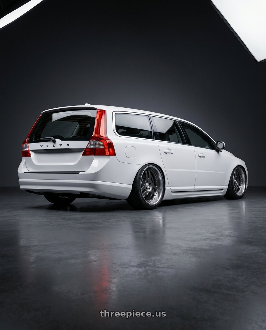 2014 Volvo V70 wagon with Heritage Wheel TSUKUBA wheels rear three quarter view slight stretch tires