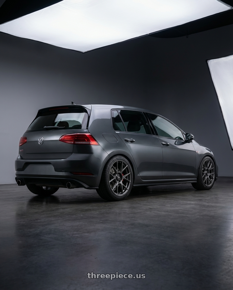 2019 Volkswagen GTI MK7 with Konig Ampliform 5x112 18x8.5+43 Dark Metallic Graphite wheels rear three quarter view square tires