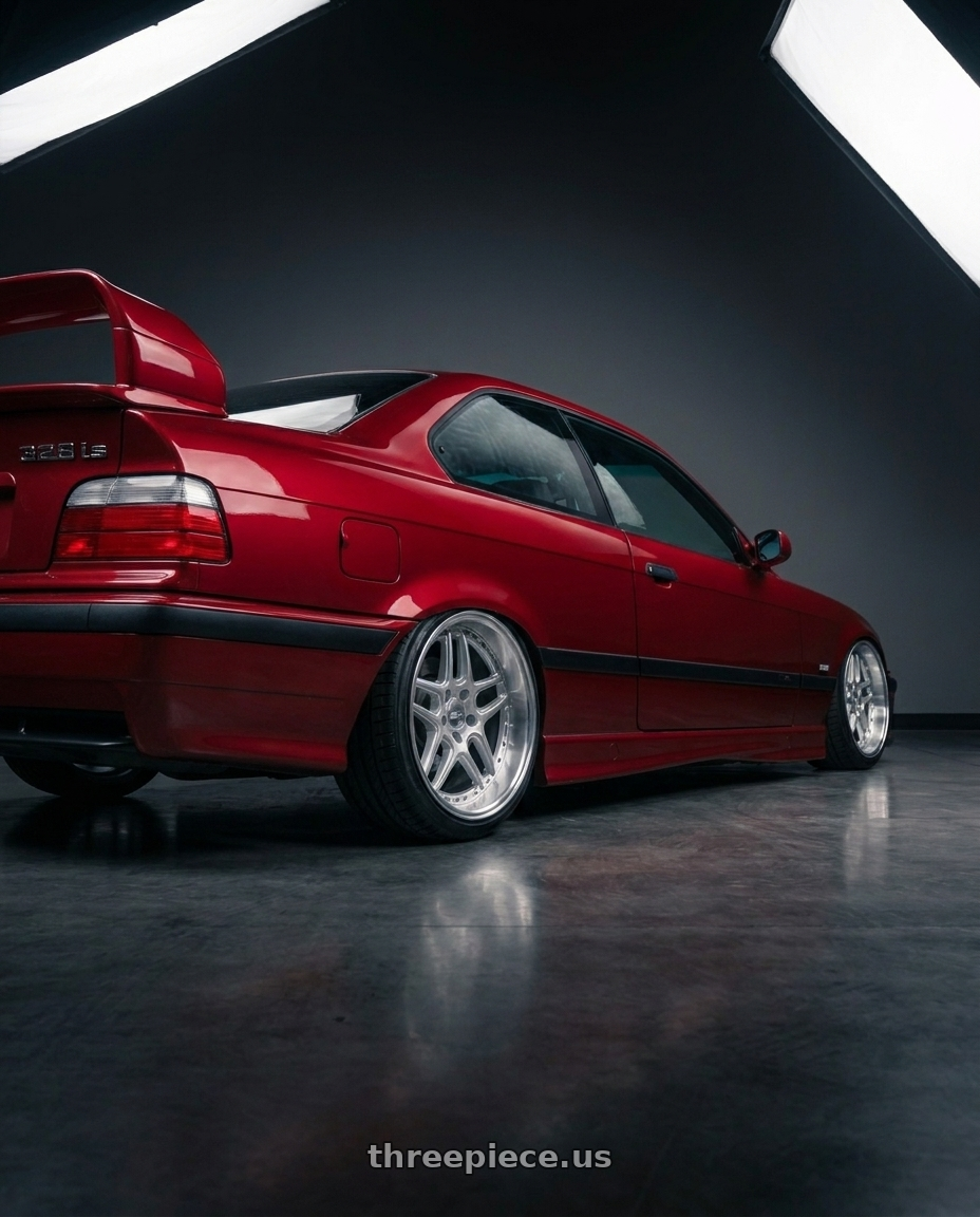 1996 BMW E36 328is with ESR Wheels SR SERIES SR01 5x100 18x8.5 +30 Hyper Silver wheels rear three quarter view slight stretch tires