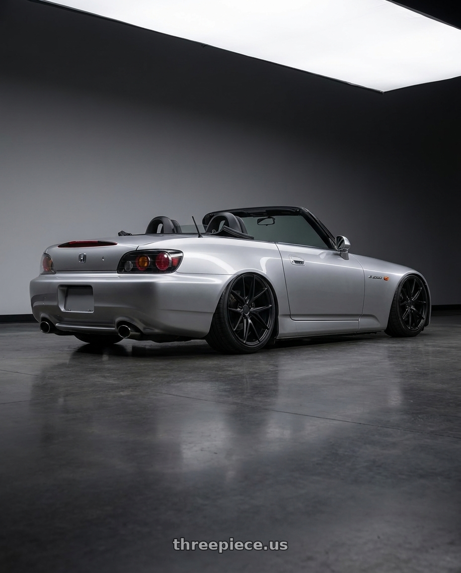 2009 Honda S2000 with Niche 1PC M117 MISANO 5X114.3 18X8 +42 MATTE BLACK wheels rear three quarter view slight stretch tires