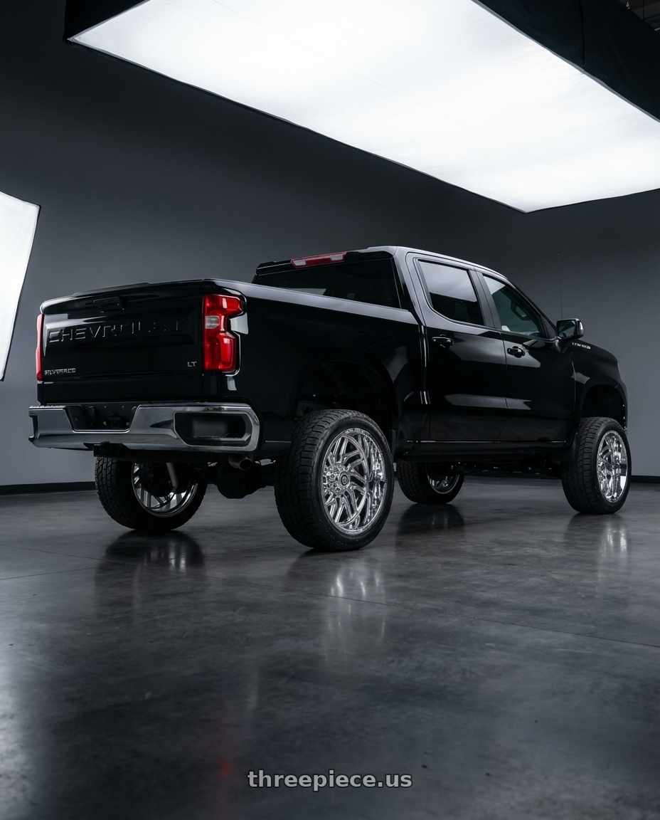 2023 Chevrolet silverado 1500 LT Black with TIS 544C 5x139.7/5X150 20x9 +17 Chrome Plated wheels rear three quarter view square tires