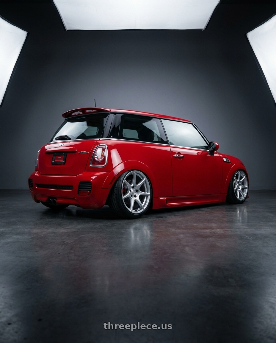 2013 Mini cooper jcw with Kansei K11S Tandem 5x114.3 17x9 35 Hyper Silver wheels rear three quarter view slight stretch tires