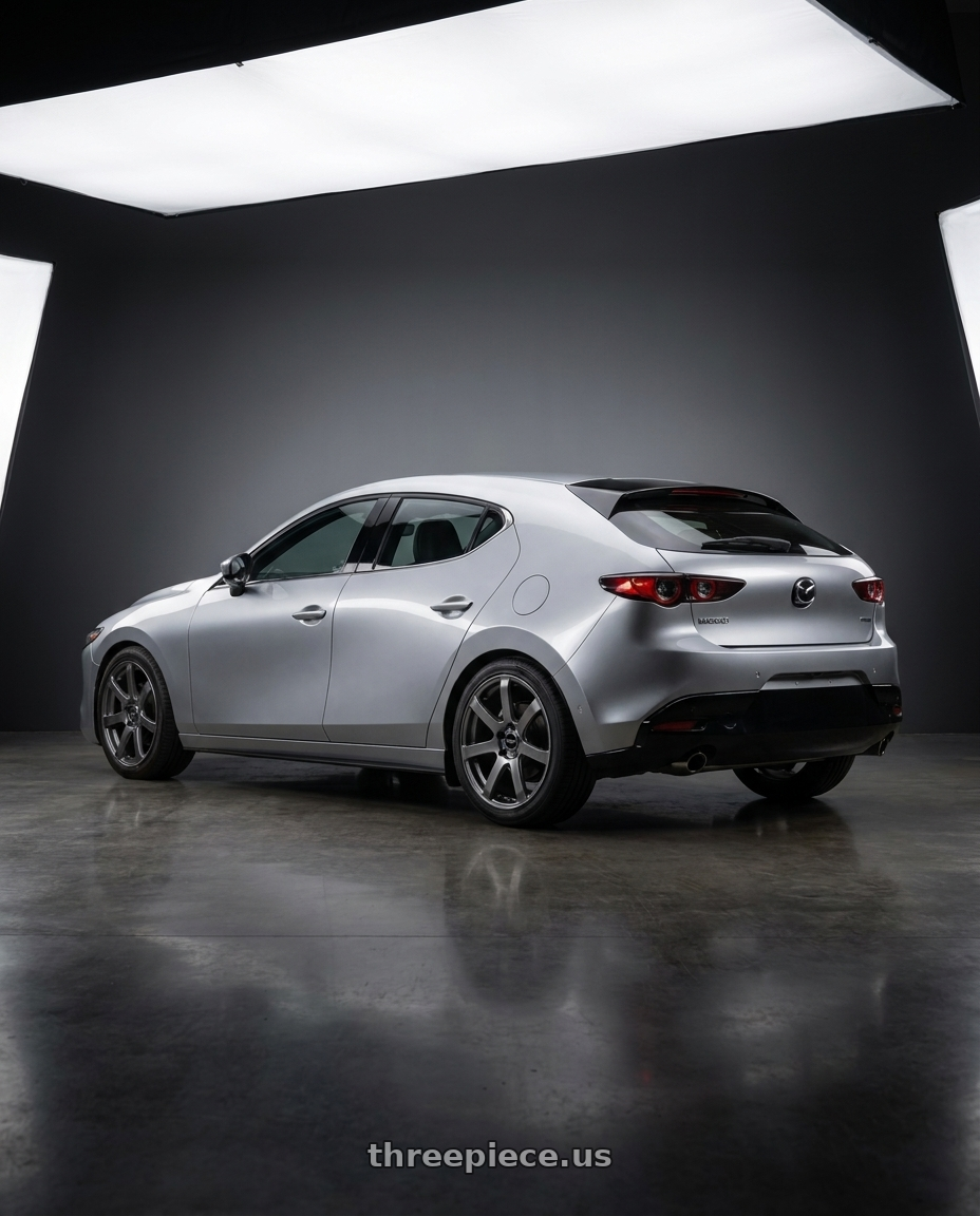 2022 mazda 3 with Enkei PF07 5x114.3 18x8+45 Dark Silver wheels rear three quarter view slight stretch tires