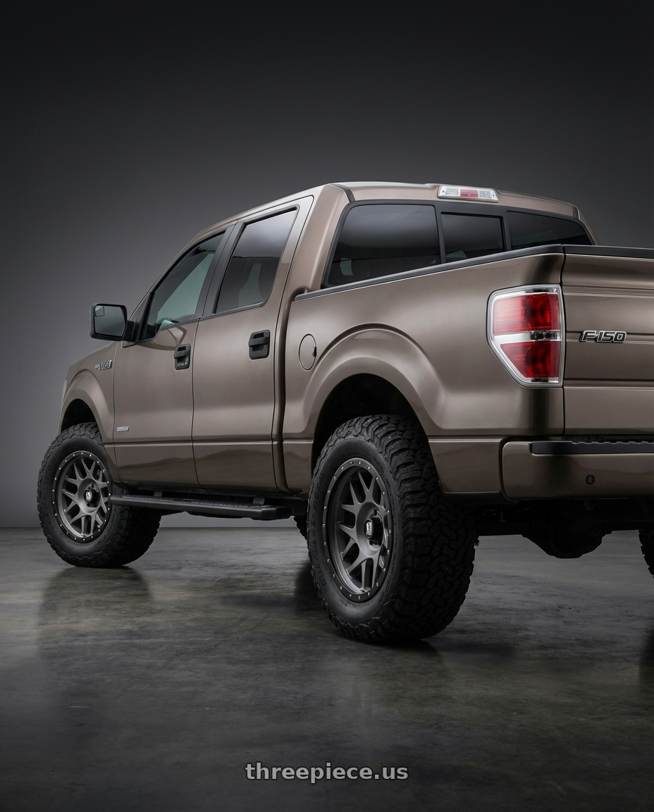 2013 Ford F-150 with XD XD127 BULLY 6X135 20X9 +18 MATTE GRAY BLACK RING wheels rear three quarter view meaty tires