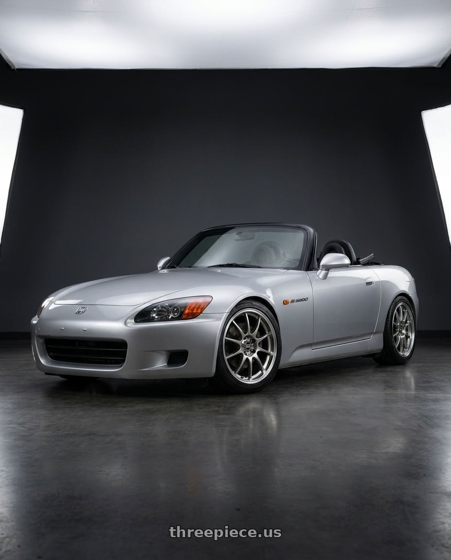 2002 Honda s2000 with Enkei J10 4x100/114.3 15x6.5+38 Silver w/ Machined Lip Dia wheels