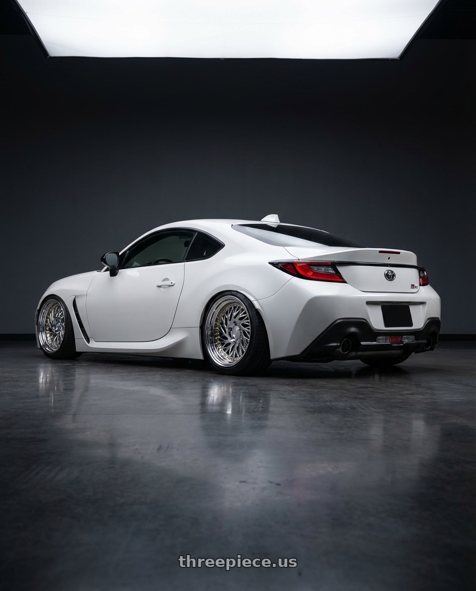 2016 Scion FR-S with Aodhan DS03 5x100 18x9.5 +35 Vacuum Chrome w/Gold Rivets wheels rear three quarter view slight stretch tires