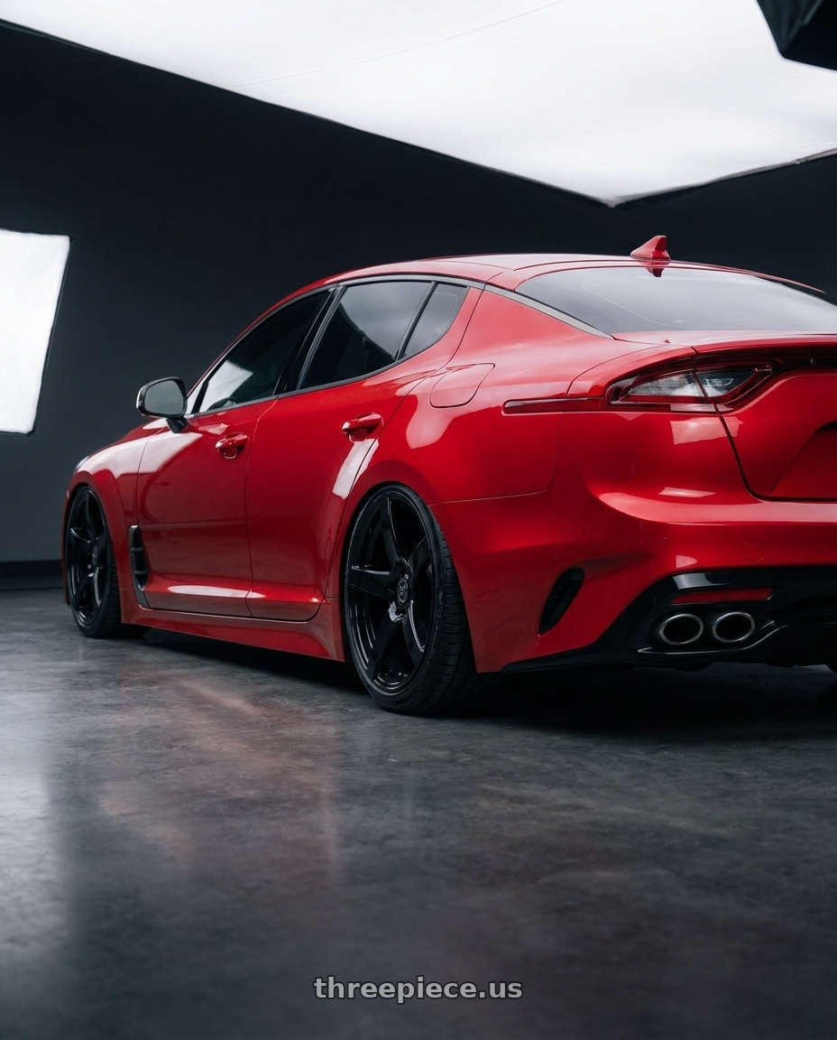 2022 Kia Stinger GT with Forgestar CF5 5x114.3 19x9 +35 Gloss Black wheels rear three quarter view slight stretch tires