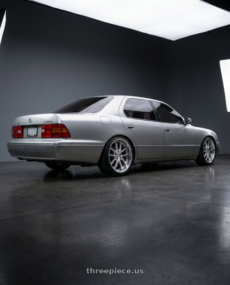1994 Lexus Ls400 with Vors AR5 5x114.3 19x9.5 +35 Silver Machine Face Lip Chrome Rivet wheels rear three quarter view slight stretch tires
