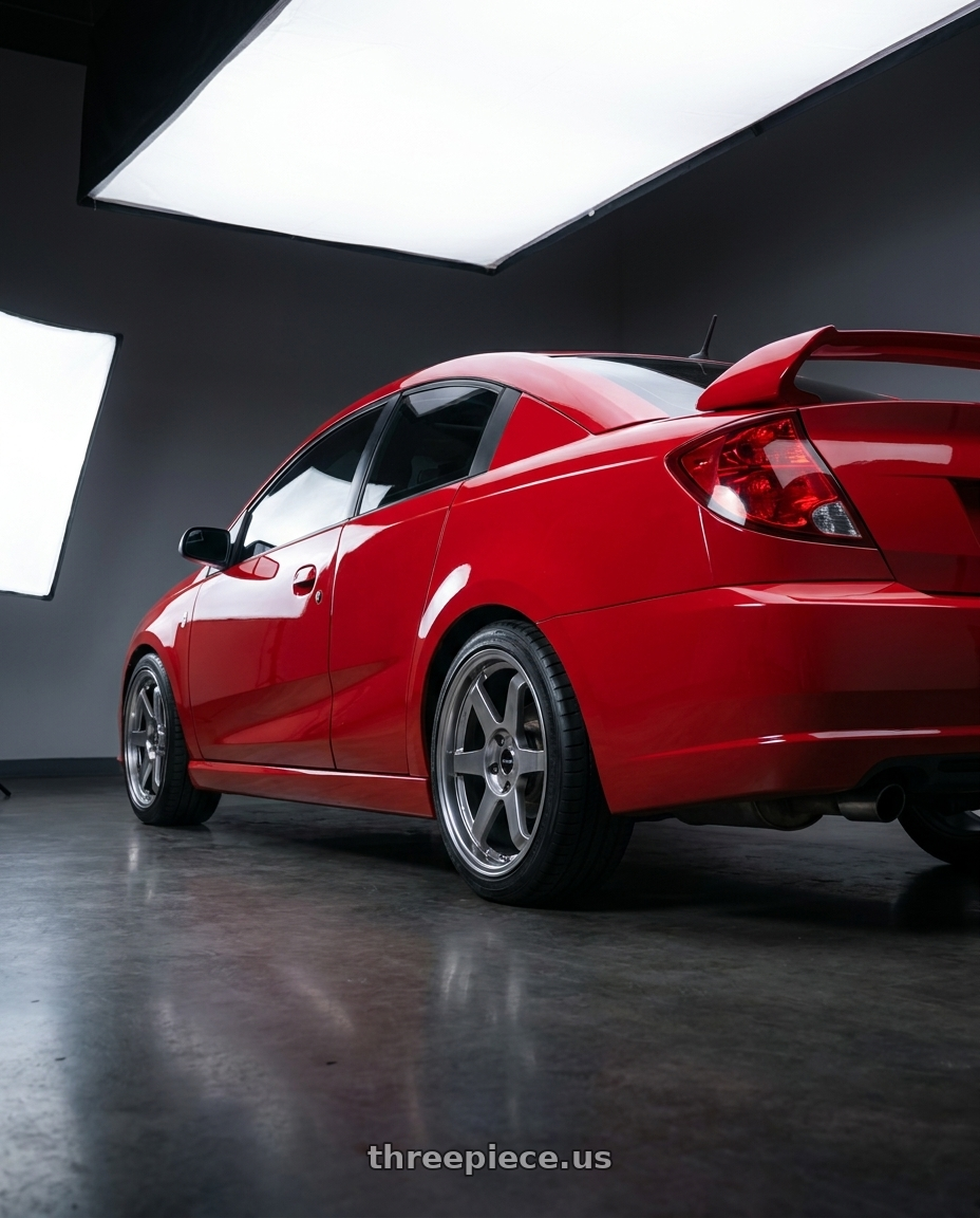2005 Saturn Ion Redline Chili Pepper Red with Vors TR37 5x110 18x8.5  +35 Hyper Black wheels rear three quarter view square tires