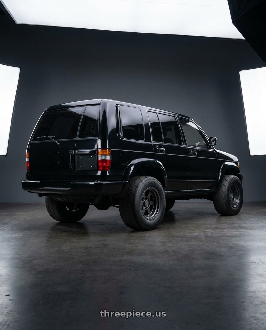 2003 isuzu trooper with 9six9 SIX-1 Deep 6x139.7 17X8.5 -10 Carbon Gray wheels rear three quarter view excessive tires