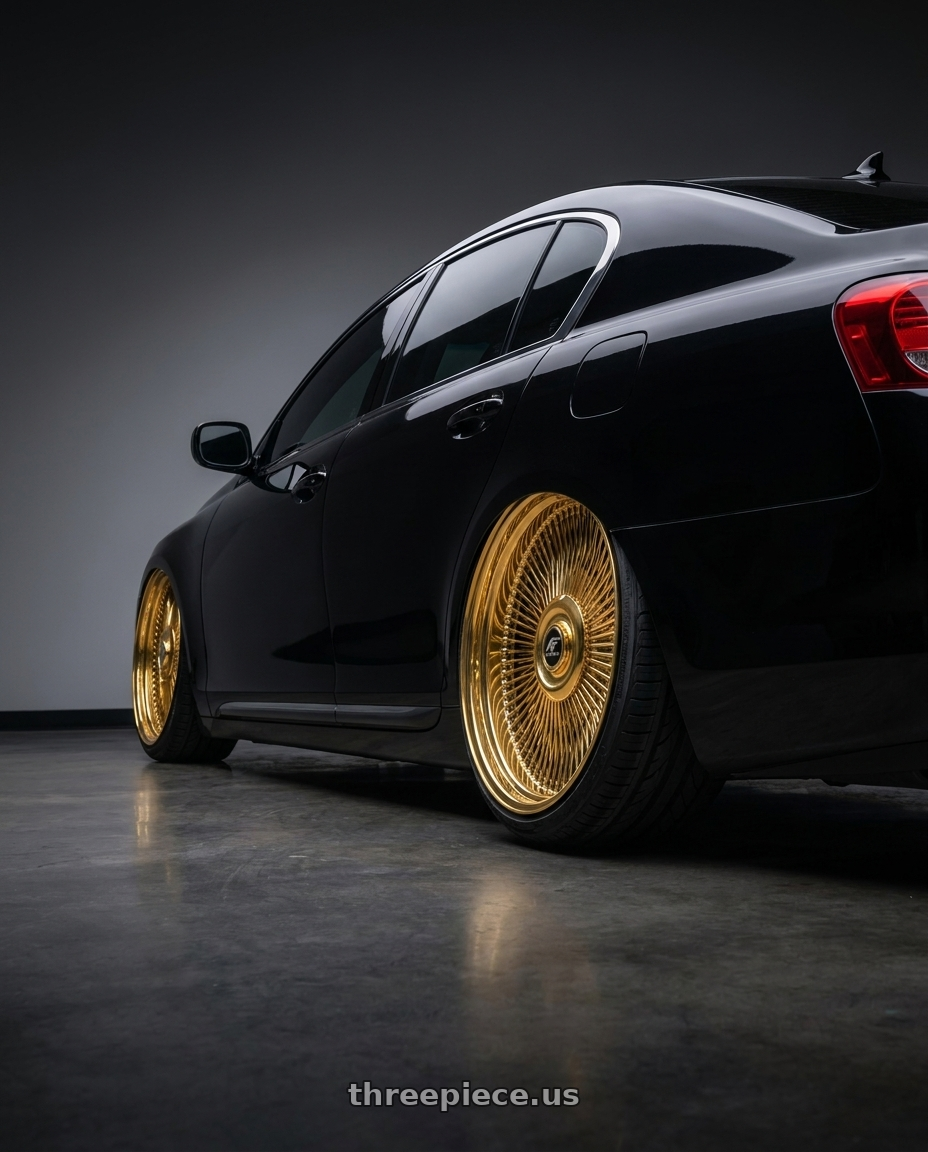 LEXUS GS300 2005 with Amani AMA-603 5x120/5x127 26x9 +1 Yellow Gold wheels rear three quarter view extreme stretch tires