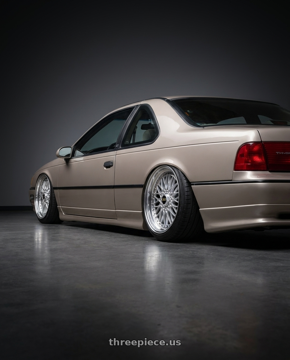 1990 Ford Thunderbird Supercoupe with BBS Super 5x112 19x9 +28 Diamond Silver wheels rear three quarter view extreme stretch tires