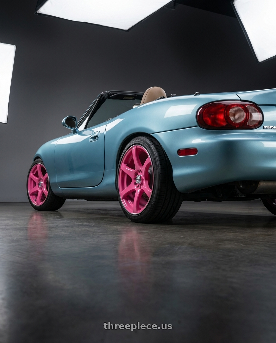 2002 Mazda Miata with RTX Ink 4x100 15x6.5 +40 Diva (pink Machined) wheels rear three quarter view square tires