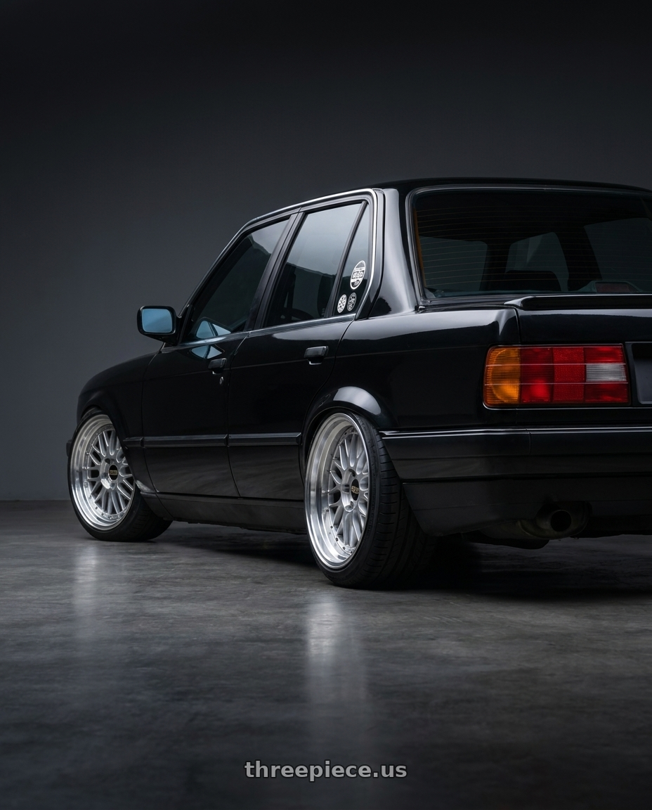 1989 bmw e30 with BBS LM 4x100 17x7.5+40 Diamond Silver wheels rear three quarter view slight stretch tires