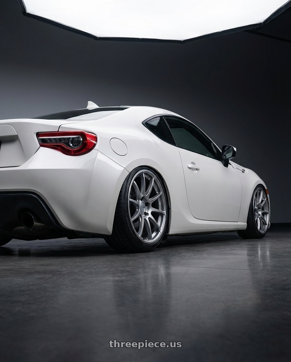 2016 Scion FR-S with Ssr Gtv02 5x100 18x8.5+44  GLARE SILVER wheels rear three quarter view slight stretch tires