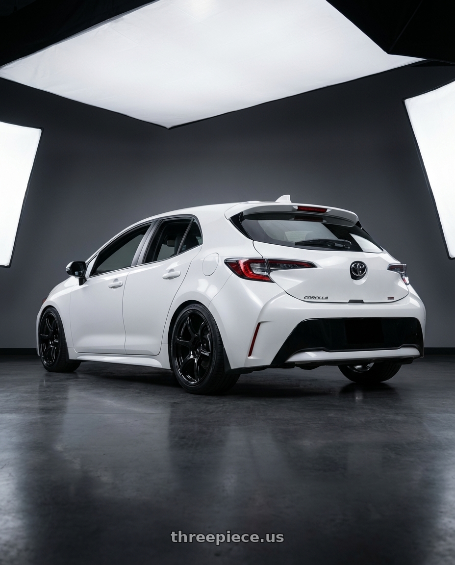 2023 Toyota Corolla Hatchback with Advan RGIII 5x114.3 18x9.0+35 Gloss Black wheels rear three quarter view square tires