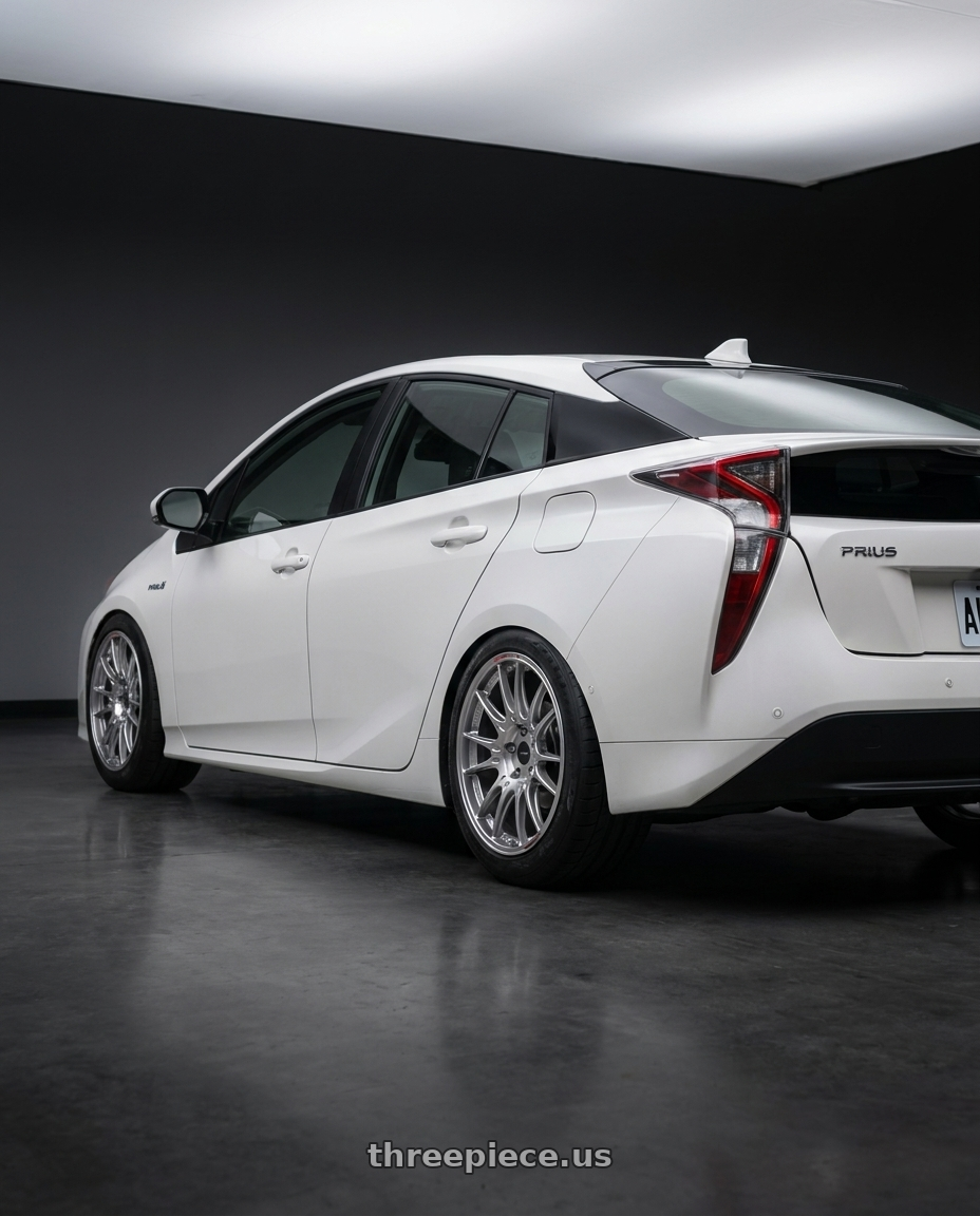 2017 Toyota Prius  with Enkei GTC02 5x114.3 18x8+35 Hyper Silver wheels rear three quarter view meaty tires