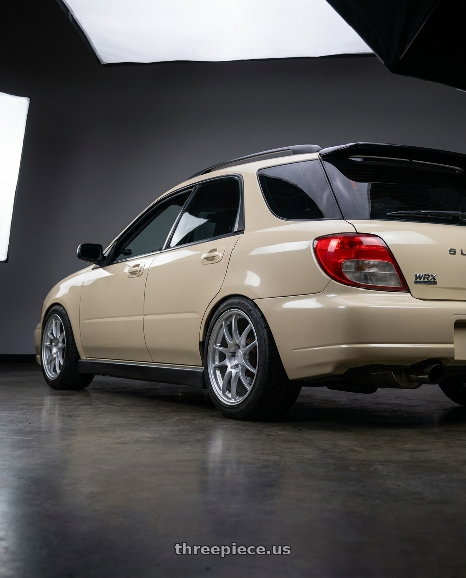 2002 Subaru Wrx Wagon with Enkei PF01 5x100 17x8+35 Silver wheels rear three quarter view meaty tires