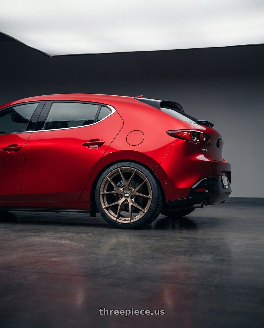 2025 Mazda 3 with ESR Wheels FORGETECH SERIES RF2 5x108 19x8.5 +30 Matte Bronze wheels rear three quarter view square tires