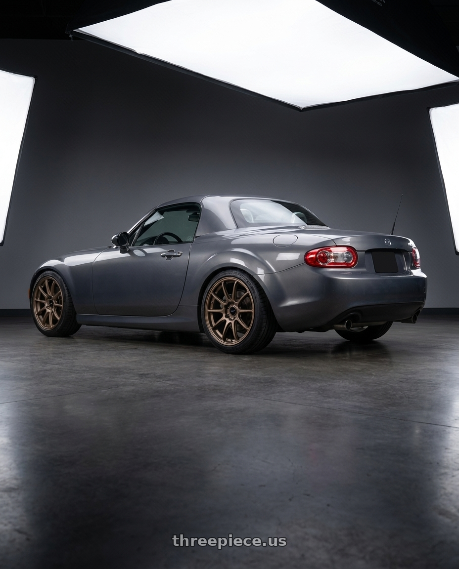 2014 Mazda Miata with Enkei Triumph 5x100 17x9+45 Matte Bronze wheels rear three quarter view slight stretch tires