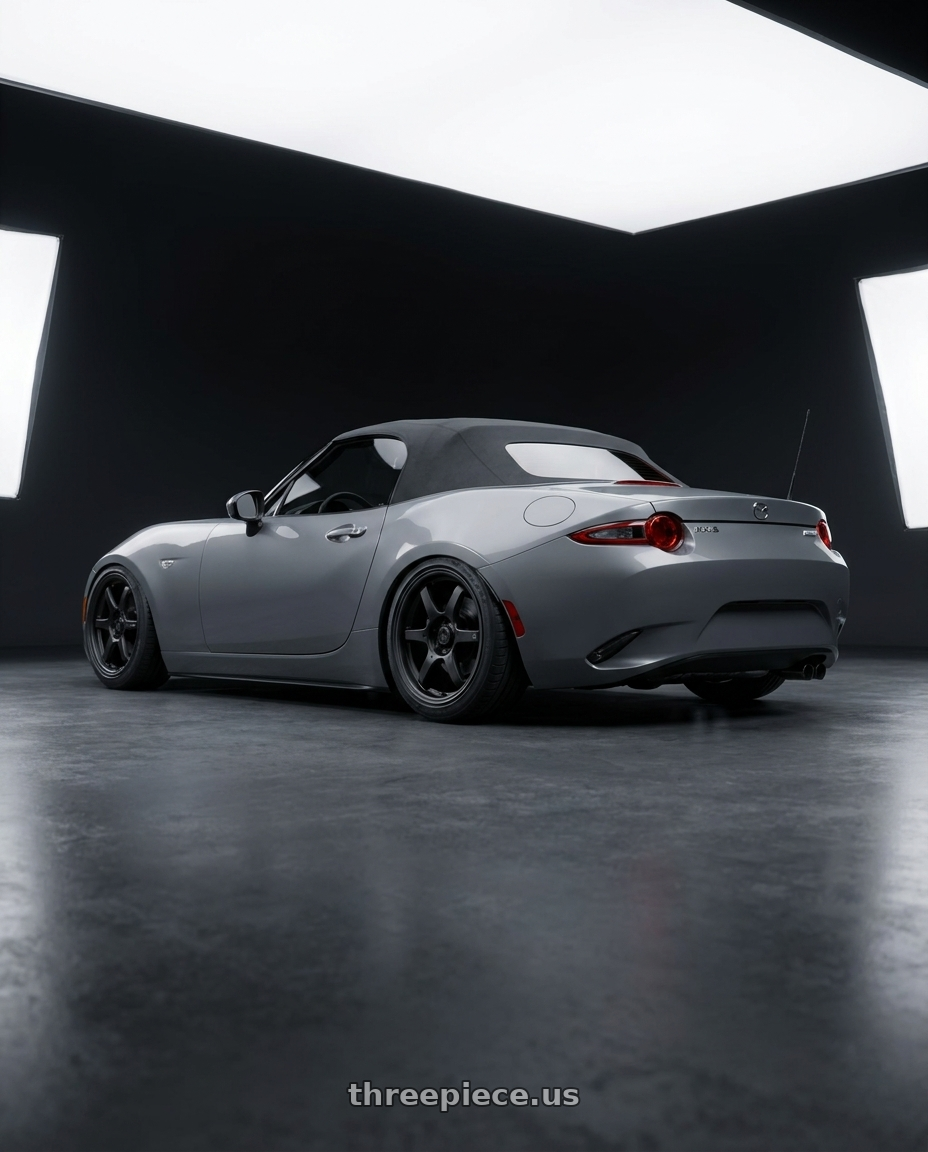 2021 Mazda MX-5 Miata ND with Konig Backbone 5x114.3 17x7.5+45 Matte Black Milling Logo on Spoke wheels rear three quarter view slight stretch tires